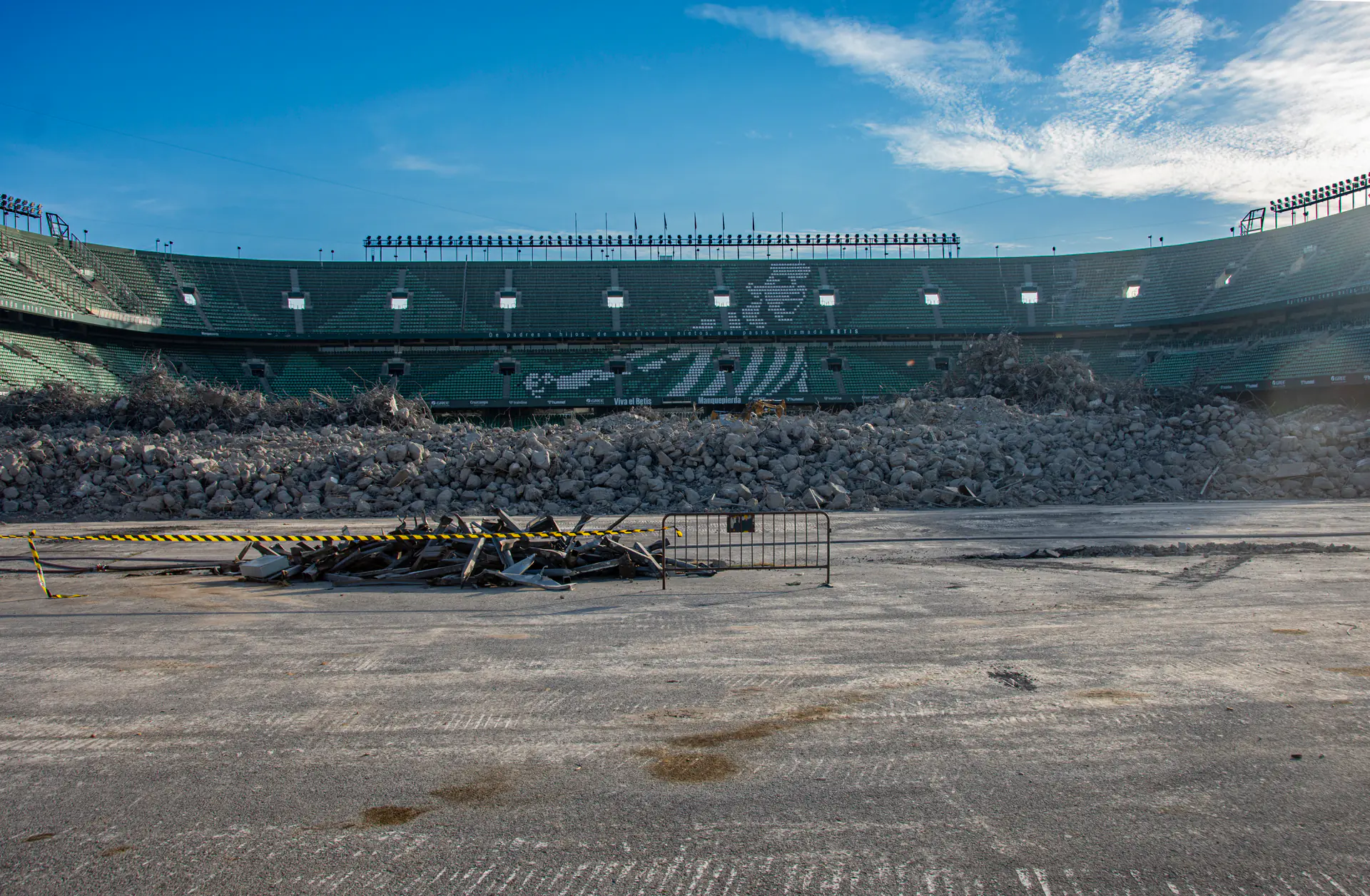 Estadio Benito Villamarín during the 2025 rebuild, with the Gol Sur stand demolished and rubble across the pitch