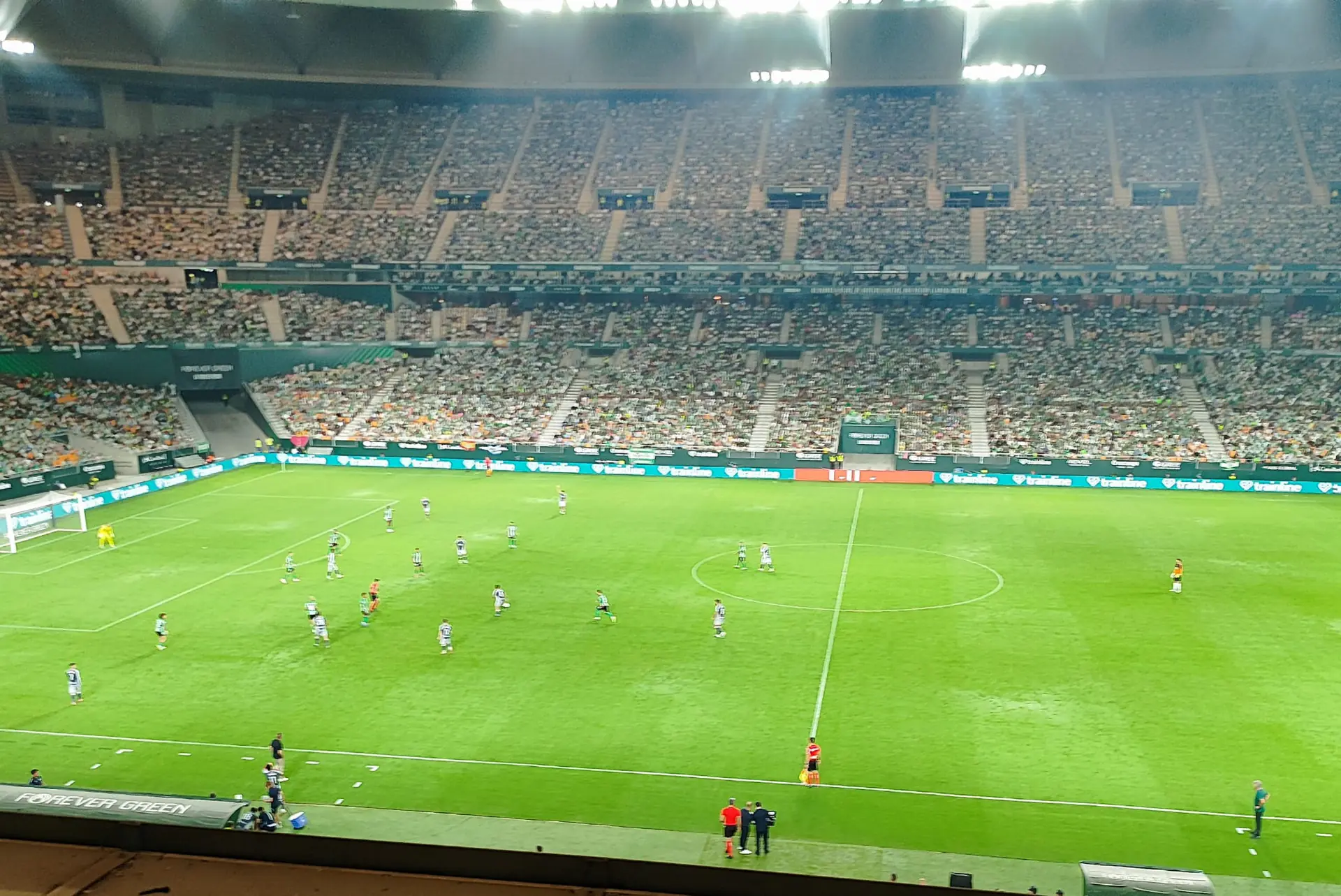 Estadio La Cartuja in Seville during a Real Betis match, seen from the upper tier with a full crowd